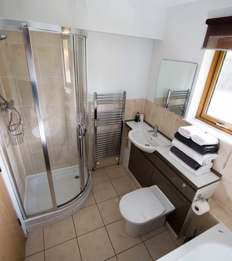 A four piece en-suite bathroom in a Chalet at Loch Lomond Waterfront