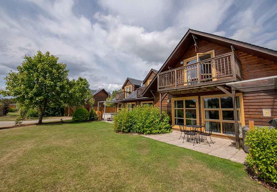 Lodges on a sunny day at Loch Lomond Waterfront