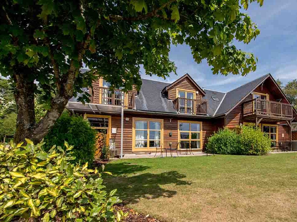 The exterior of lodges at Loch Lomond Waterfront