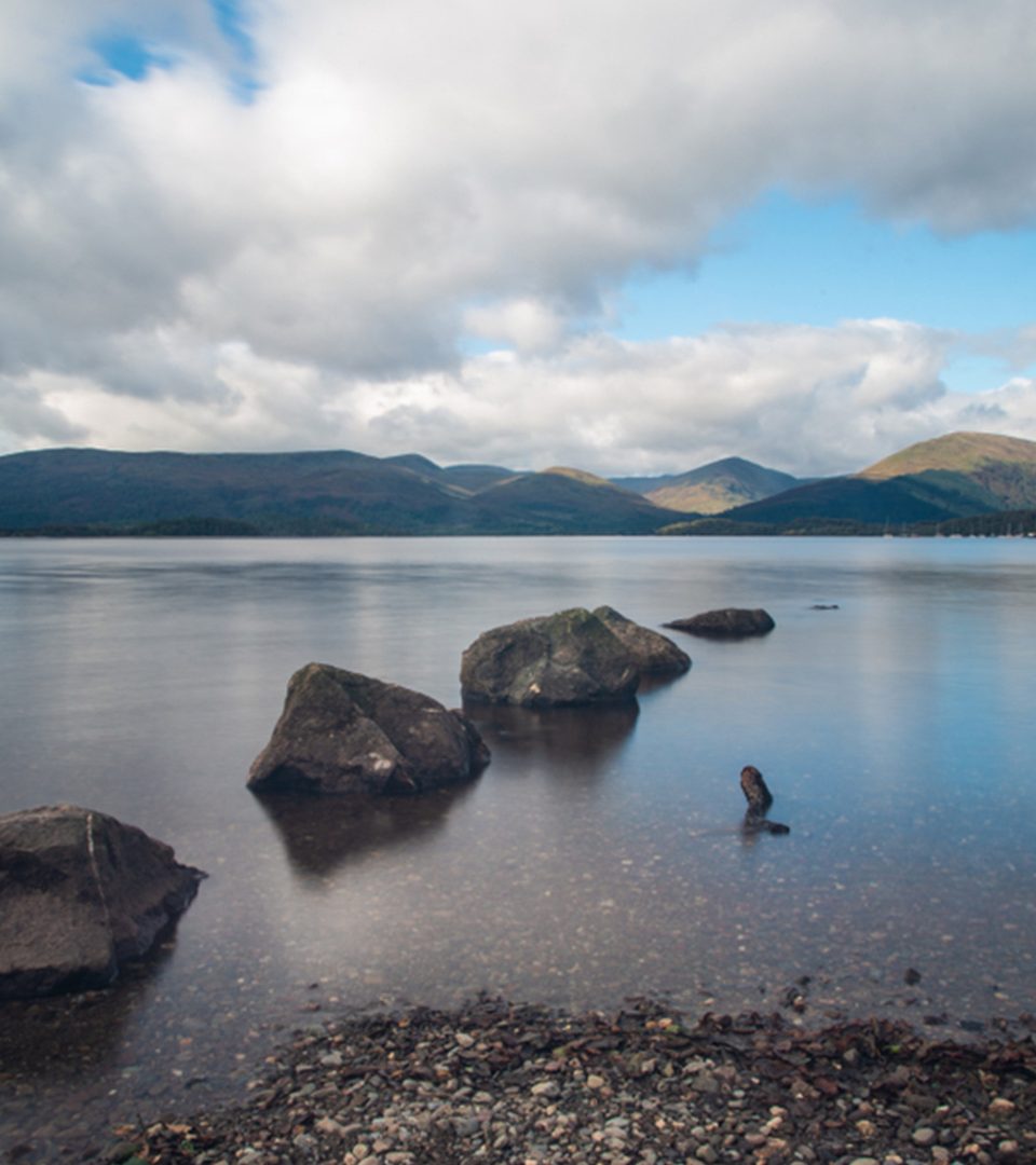 Stones in the water at Millarochy Bay Loch Lomond