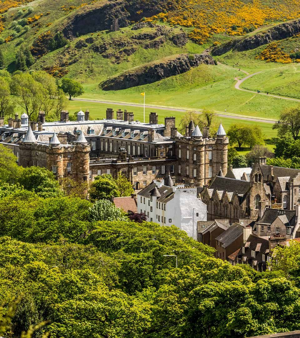 Holyrood Palace surrounded by parkland