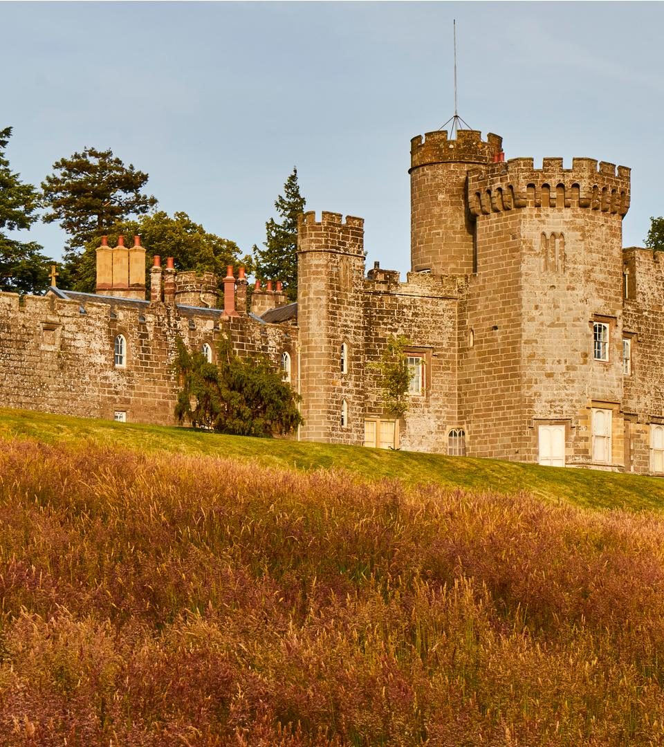 Colorful twilight view of Balloch Castle and Country Park near Loch Lomond in Scotland.