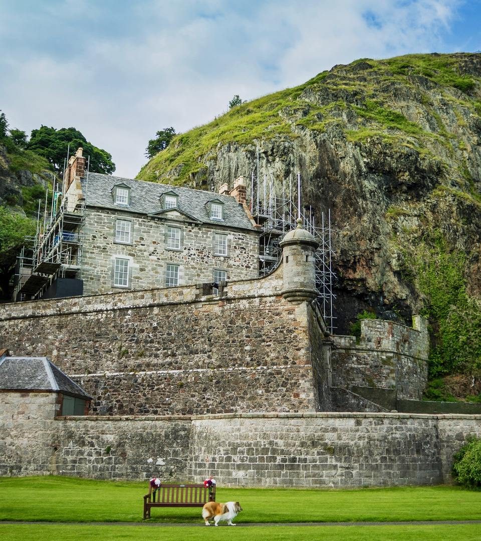 Dumbarton Castle on Green Hill and Blue Sky Background