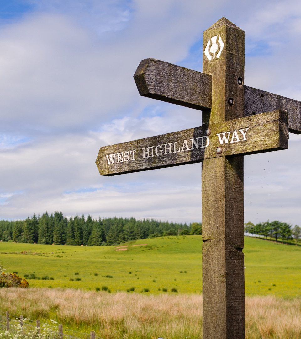 Wooden sign post on the West Highland Way