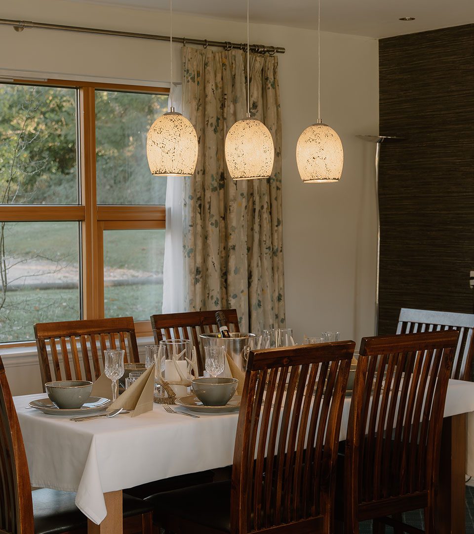 The dining room in a lodge at Loch Lomond Waterfront luxury lodges in Balmaha