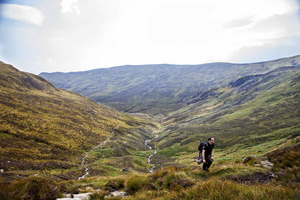 Magnificent panorama of mountains Loch Lomond & The Trossachs National Park climbing the mountains in the scottish highlands.